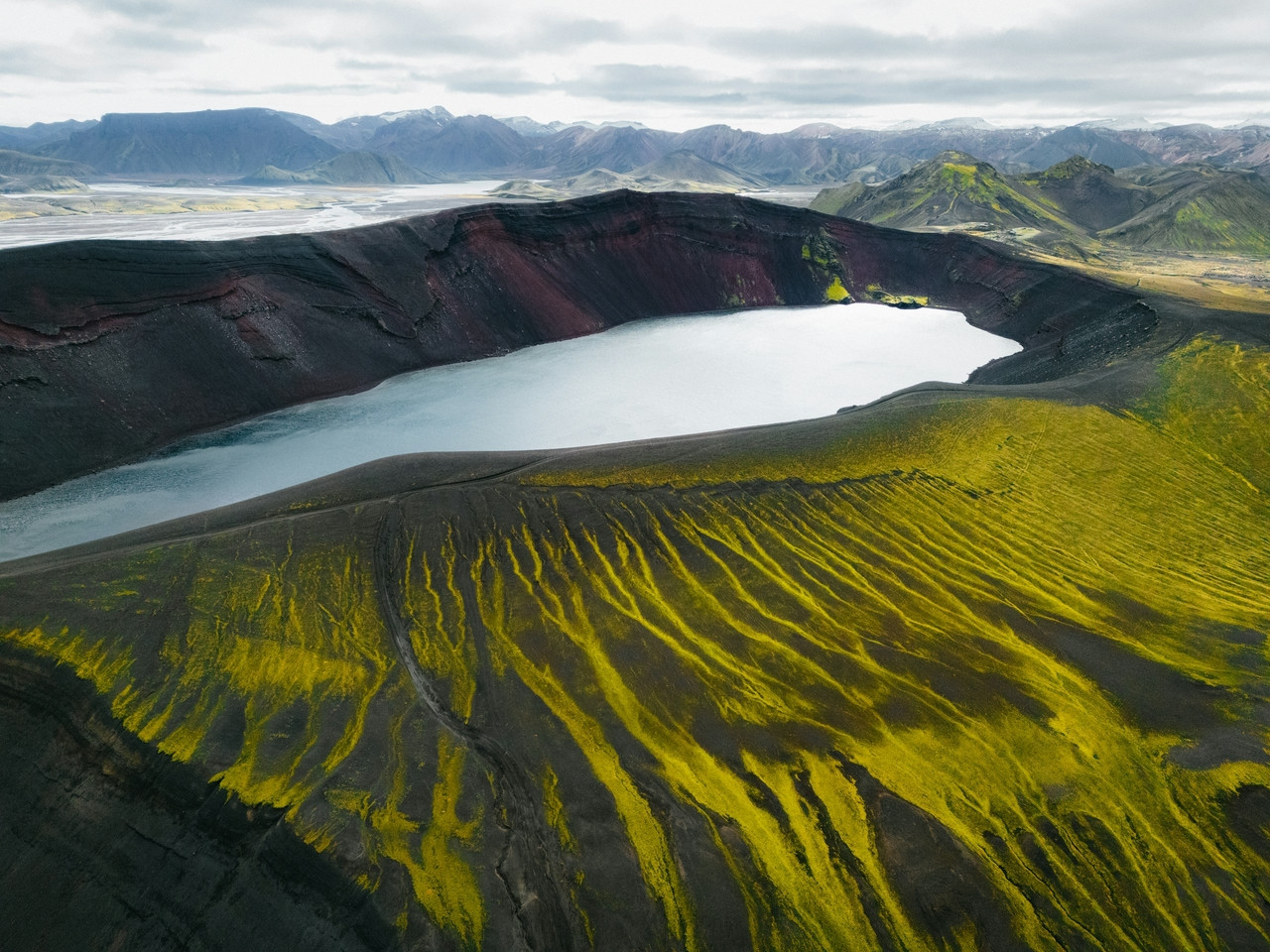 A large body of water surrounded by mountains, Ultra