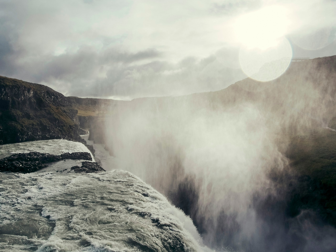 a view of a waterfall in the middle of a mountain, Ultra