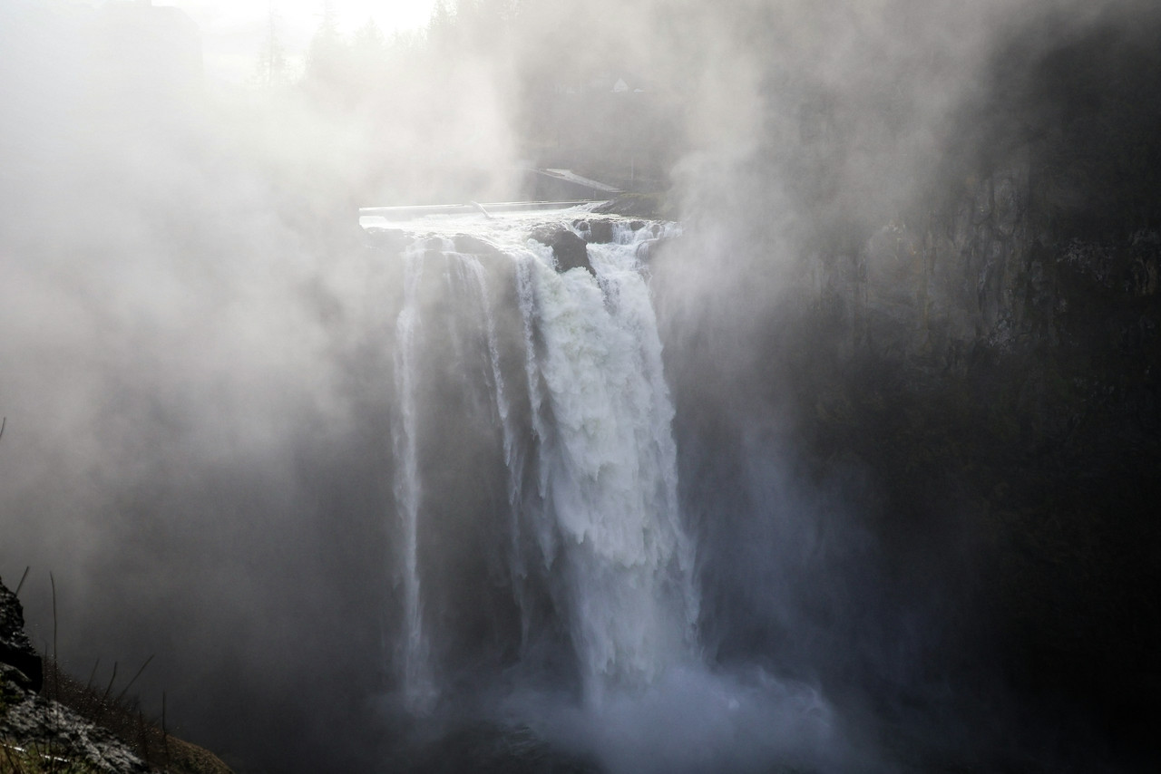 A waterfall in the middle of a foggy day, Ultra