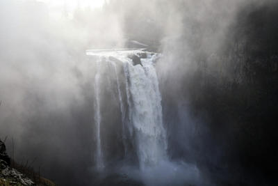A waterfall in the middle of a foggy day, Standard