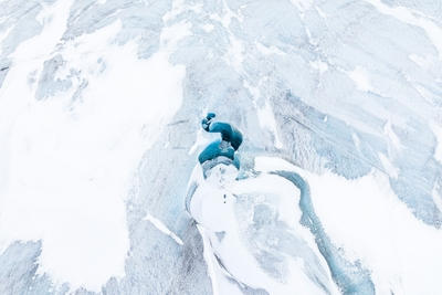 an aerial view of a snow covered mountain, Ultra