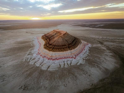 Striking layered desert mountain under a beautiful sunset sky, Standard