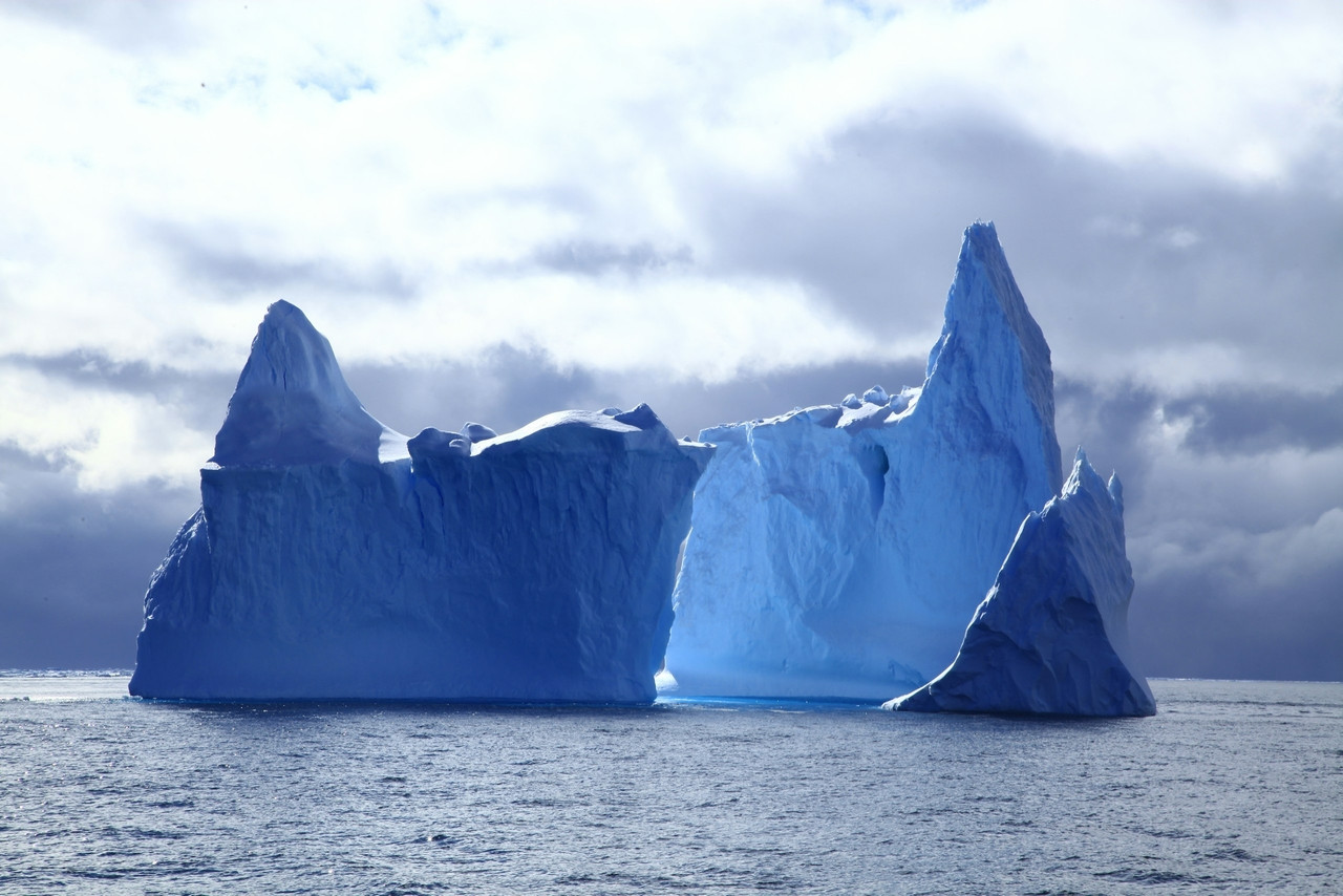 two icebergs under cloudy sky at daytime, Standard